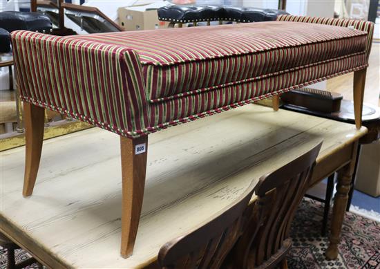 A long stool with Regency striped upholstery W.150cm.